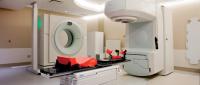A modern radiation therapy machine in a medical facility.
